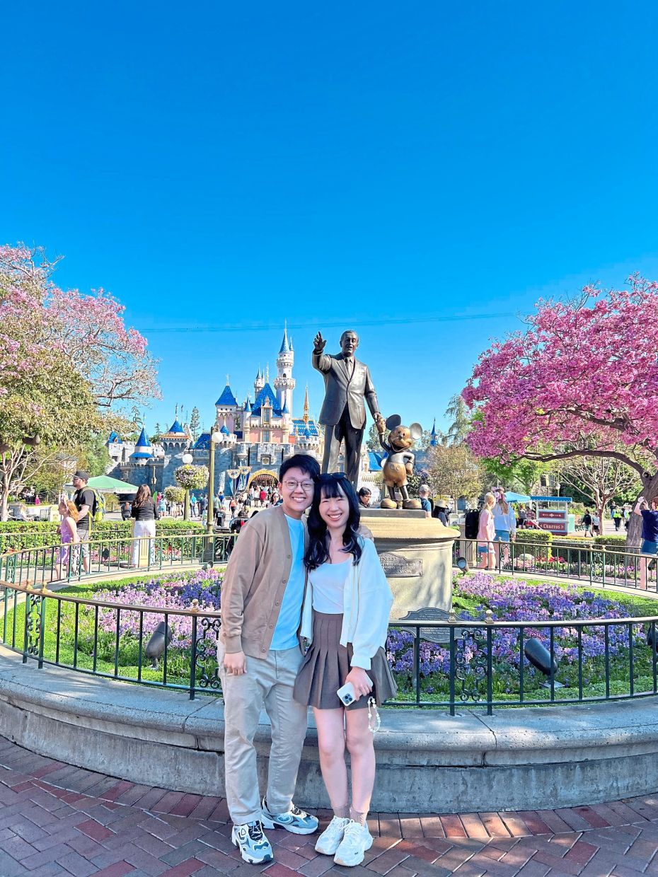 Go (left) and Lim at Disneyland Park in California. — VALERIE LIM