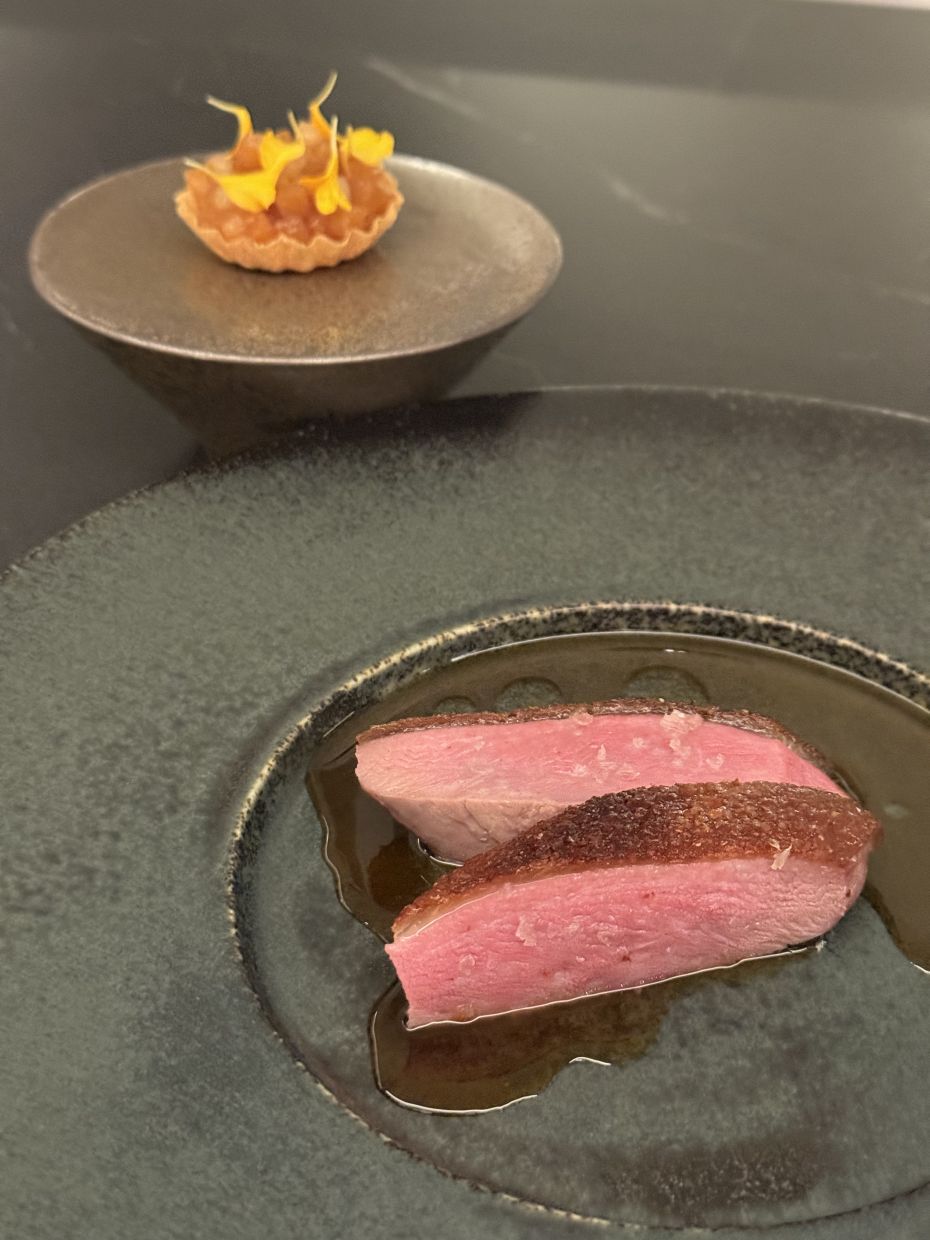 The 14-day aged duck is incredibly good and boasts crispy skin and tender, succulent meat. 