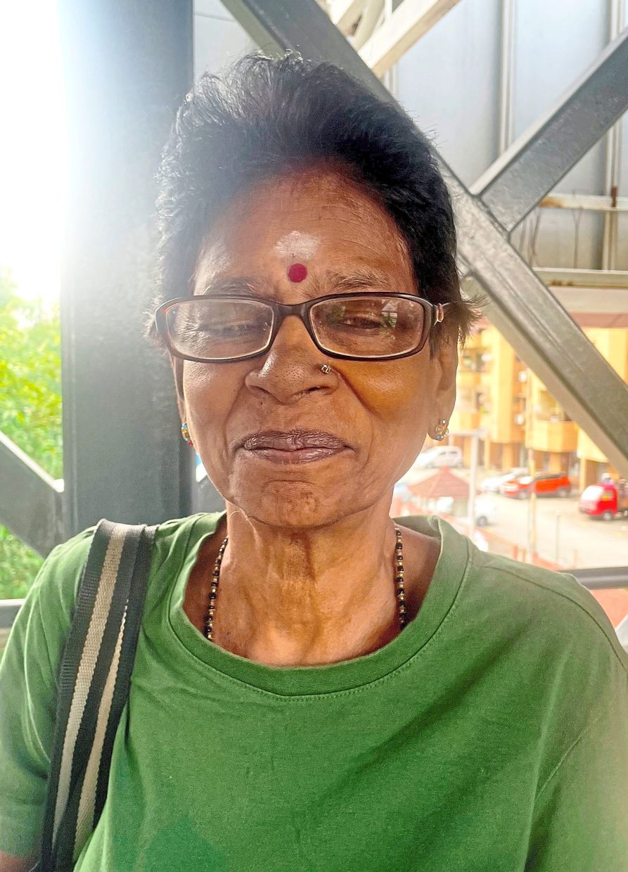 Lakshmi says the stalls along the walkways are a real nuisance.