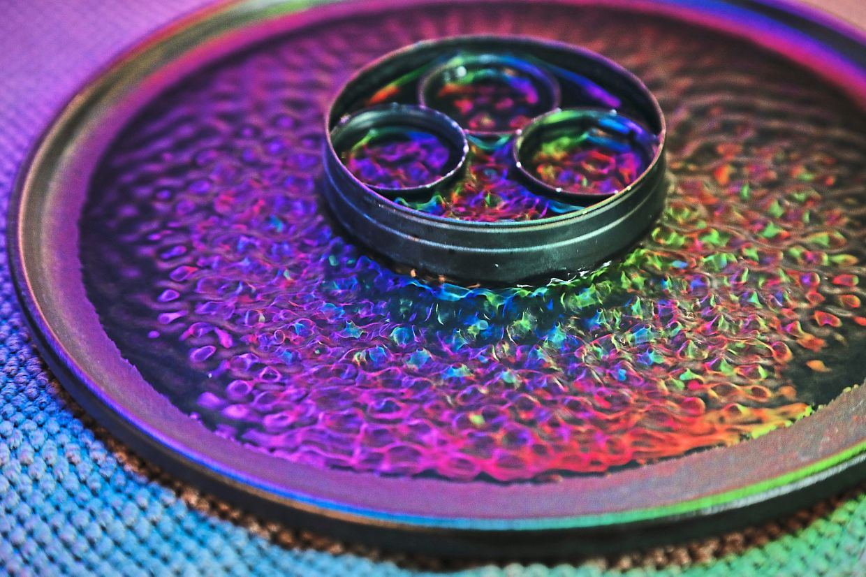 Lyne’s 'The Voice Of Water (The Mayor)', a live installation with subwoofer, water basin, LED light and video loop.