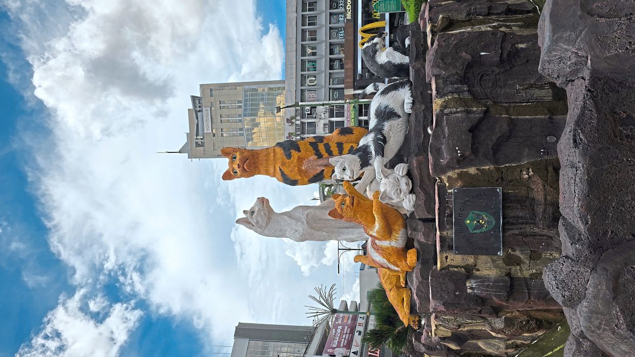 One of the famous cat statues in Kuching. — Photos: MELODY L. GOH/The Star