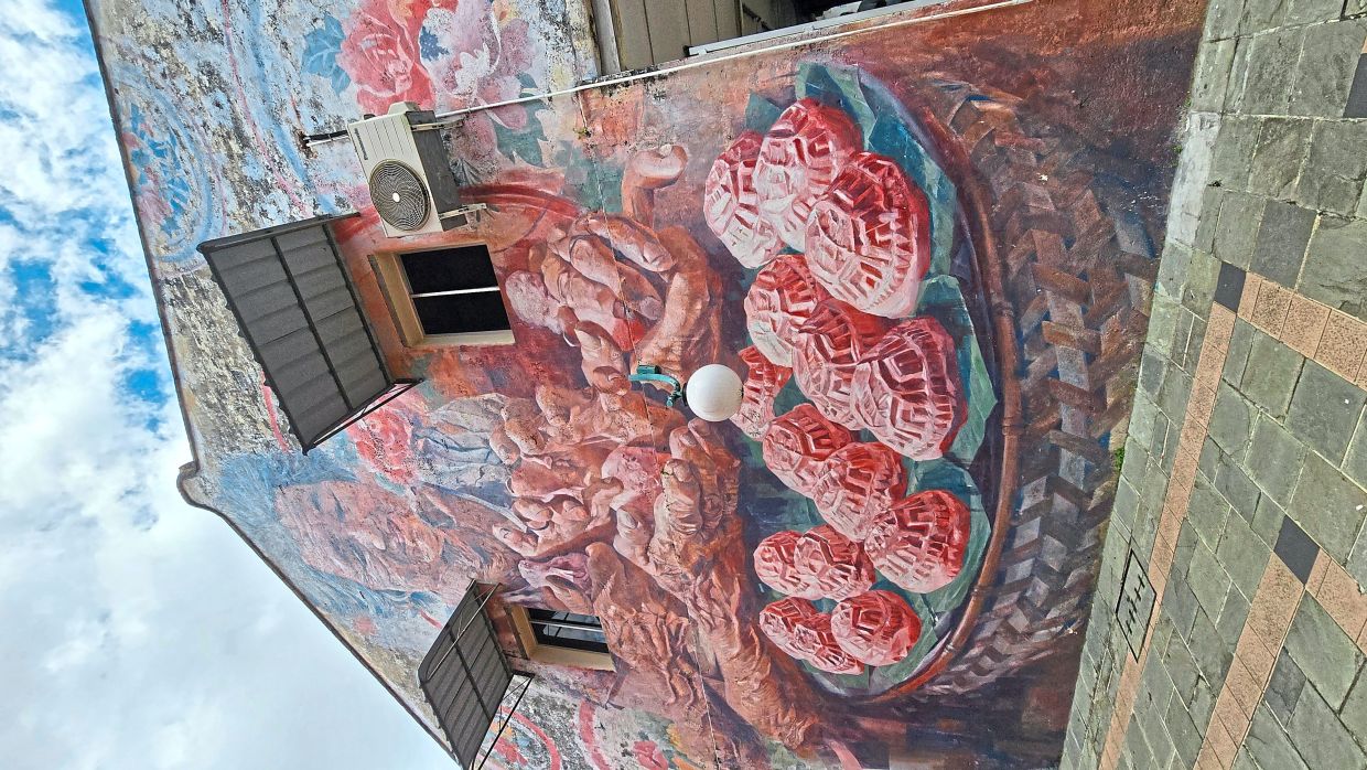 One of the murals covering the facade of a building.
