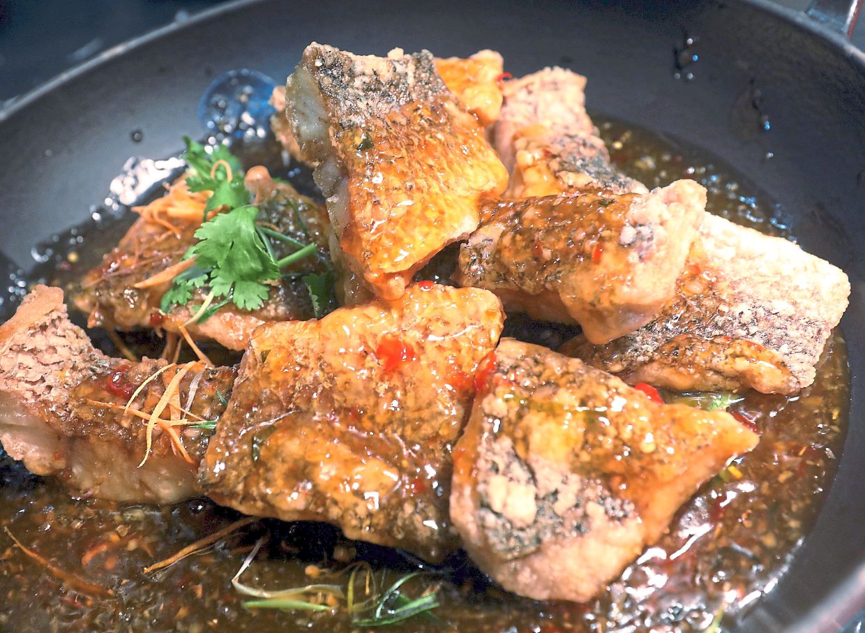 Fried Seabass Fillet with Thai Sauce. — AZLINA ABDULLAH/The Star