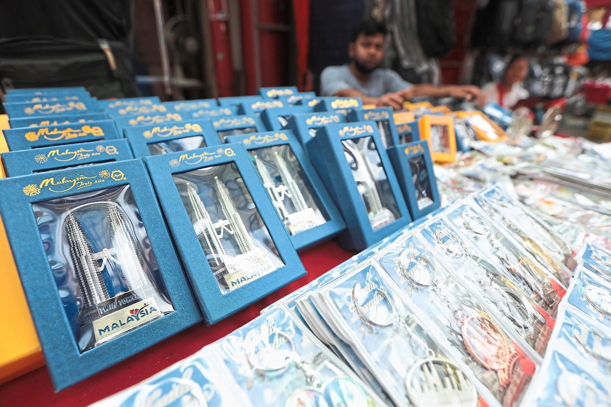 Key chains being put on display at a stall inside Petaling Street, Kuala Lumpur. — YAP CHEE HONG/The Star