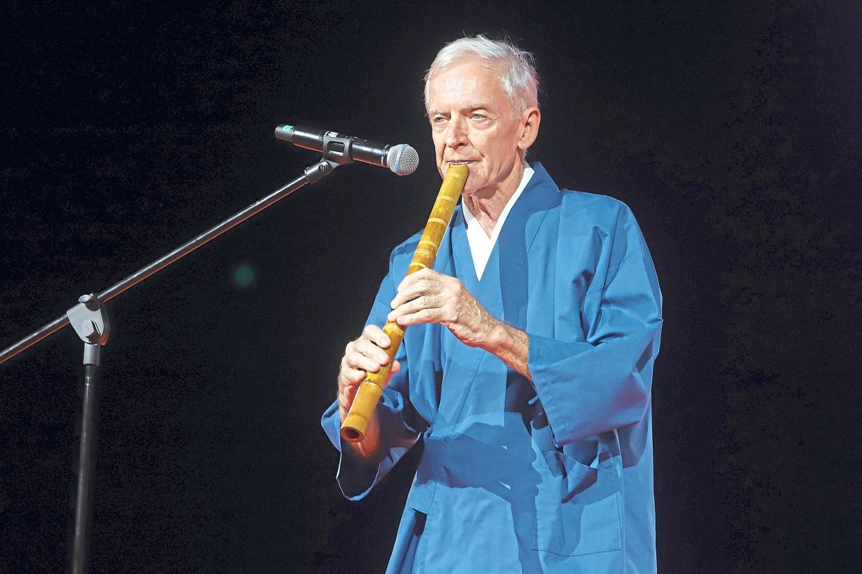 MacGregor playing the ‘shakuhachi’ at the event.