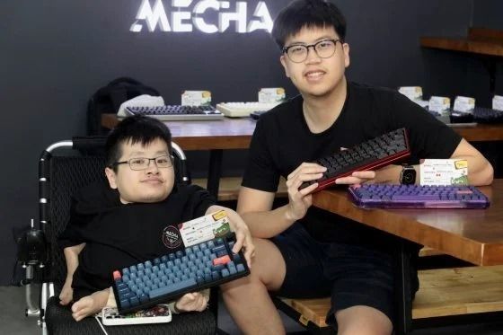 In 2022, Thong Kai (pictured with brother Jun Tat) opened Mecha, a mechanical keyboard store in Subang Jaya. Photo: Tan Thong Kai