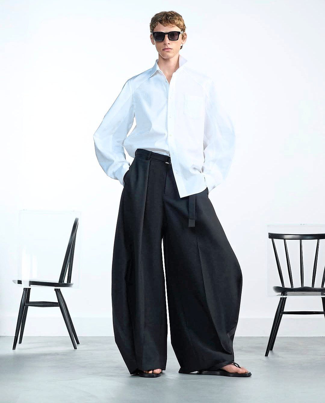 This Japanese label gives the trend a modern spin with a simple half-tuck that makes the undone look feel sharply styled. Photo: Instagram/Sacai