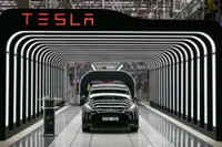Tesla starts 'first builds' of affordable model, posts steepest drop in quarterly revenue in over a decade