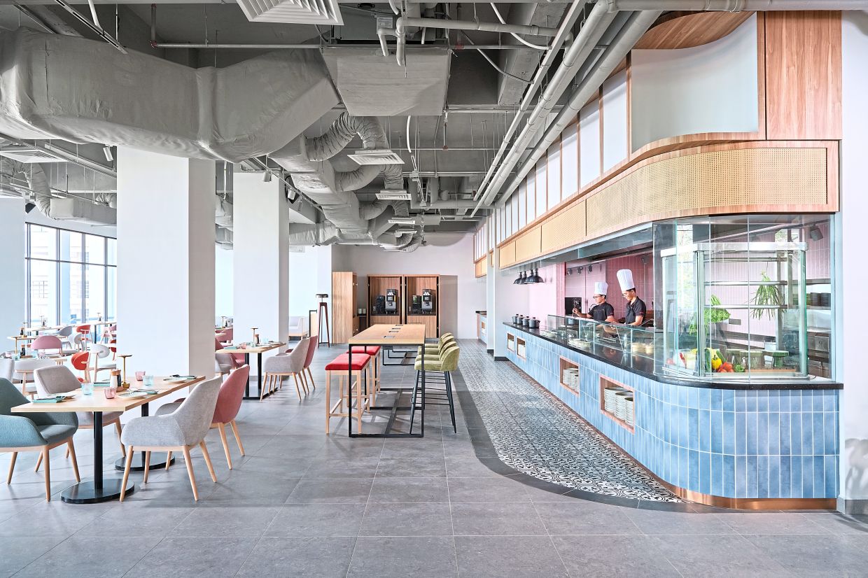 M Social’s signature restaurant, Beast and Butterflies, offers both authentic Peranakan and international cuisines.