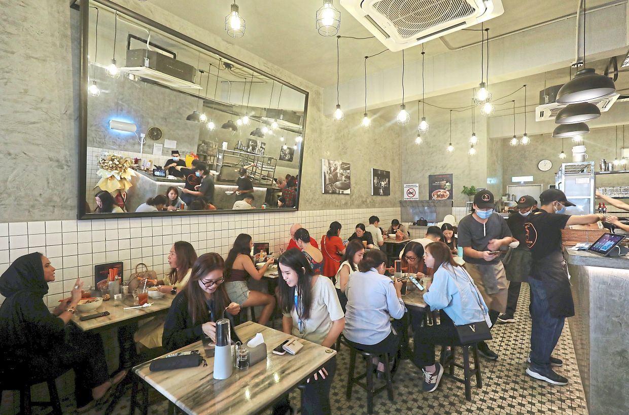 Since it opened a few months ago, the restaurant has been perpetually packed. — SAMUEL ONG/The Star