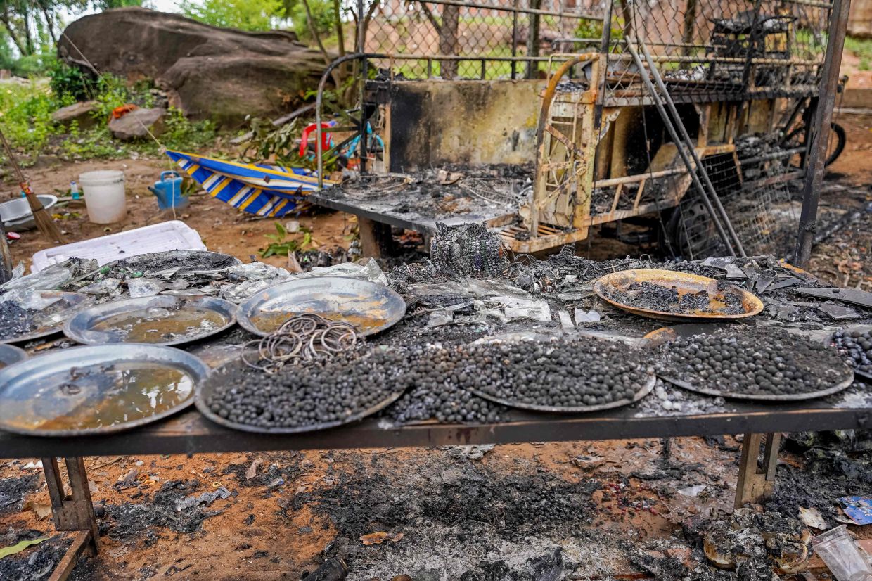 A pagoda damaged by Thai artillery is pictured in Oddar Meanchey province in Cambodia on July 25, 2025. - AFP