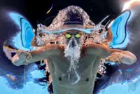 Swimming-Marchand returns to world stage after Olympic heroics