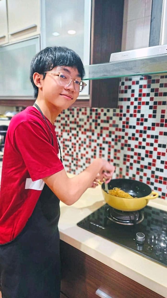 Home chef: Working the stove has become second nature to Ryan.