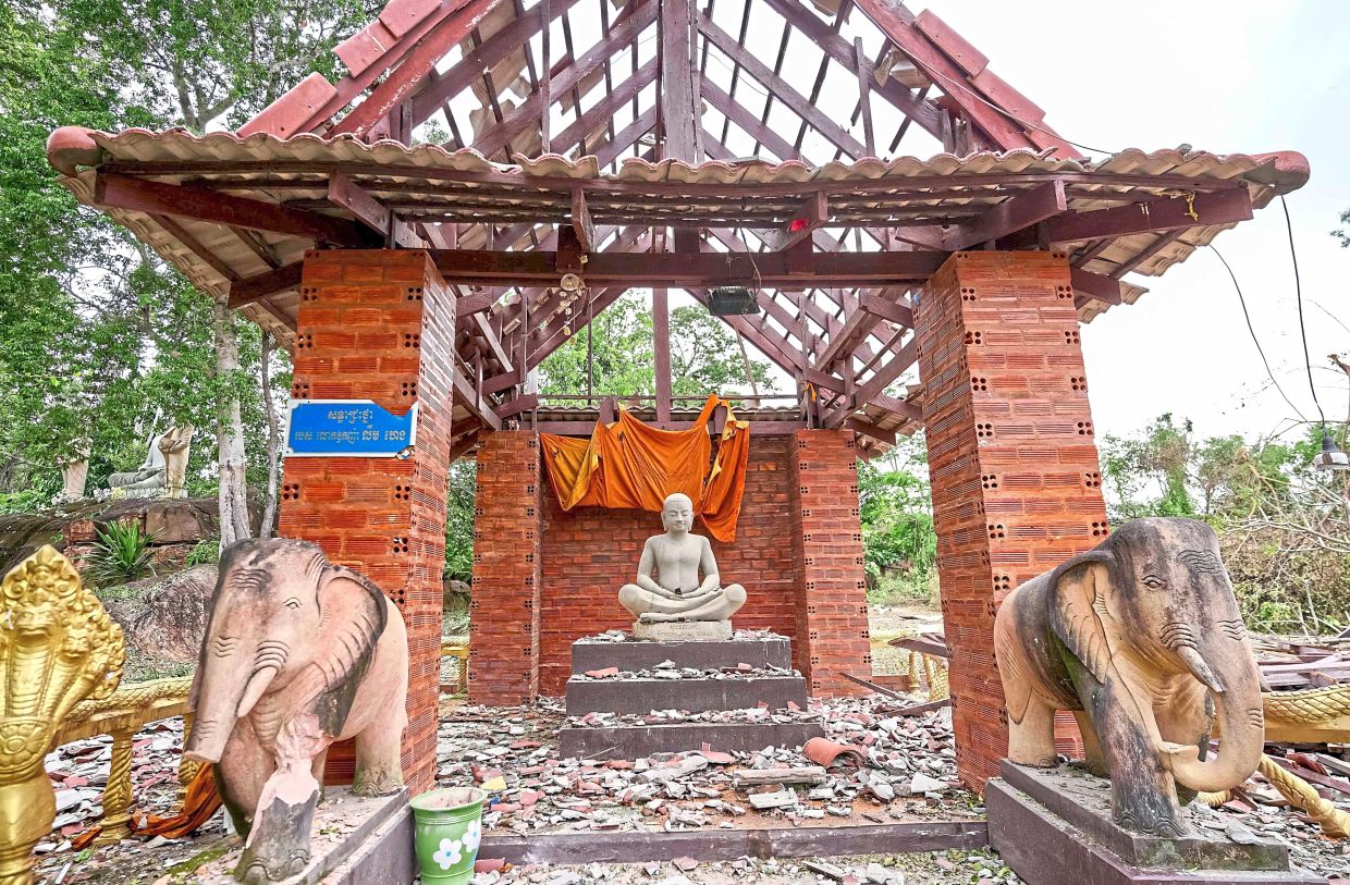 A pagoda damaged by Thai artillery in Oddar Meanchey province, Cambodia. — AFP