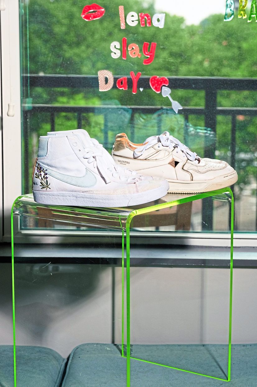 Two pairs of designer shoes and a Lucite table that once belonged to Duke University students.