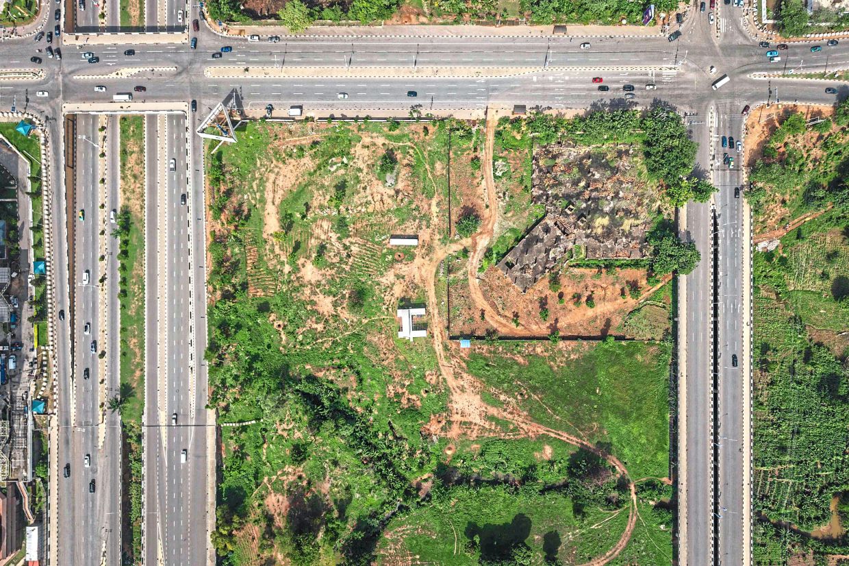 The urban farms dotting the west African capital show the limits of the top-down management the planned city is known for, oases scattered around pockmarked downtown.