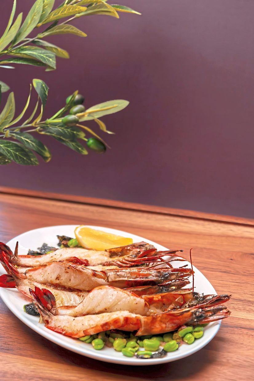 Charcoal grilled prawns and cannellini beans may not sound like ideal bedfellows but the two work remarkably well together. — Else KL