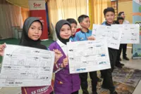 PUPILS LIGHT THE WAY IN ENERGY SAVING
