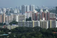 Home prices in Singapore jump ahead of curbs