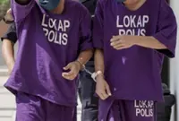 Two rally-goers arrested for allegedly 'whipping' effigy of PM