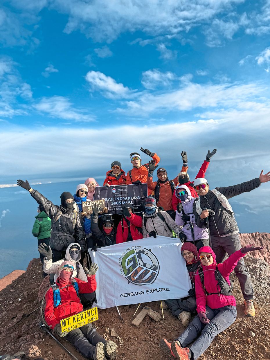 A group photo on the summit of Mount Kerinci in Sumatra. 