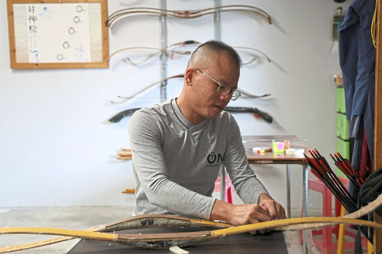 Each laminated bow is inspected thoroughly before the finishing process.