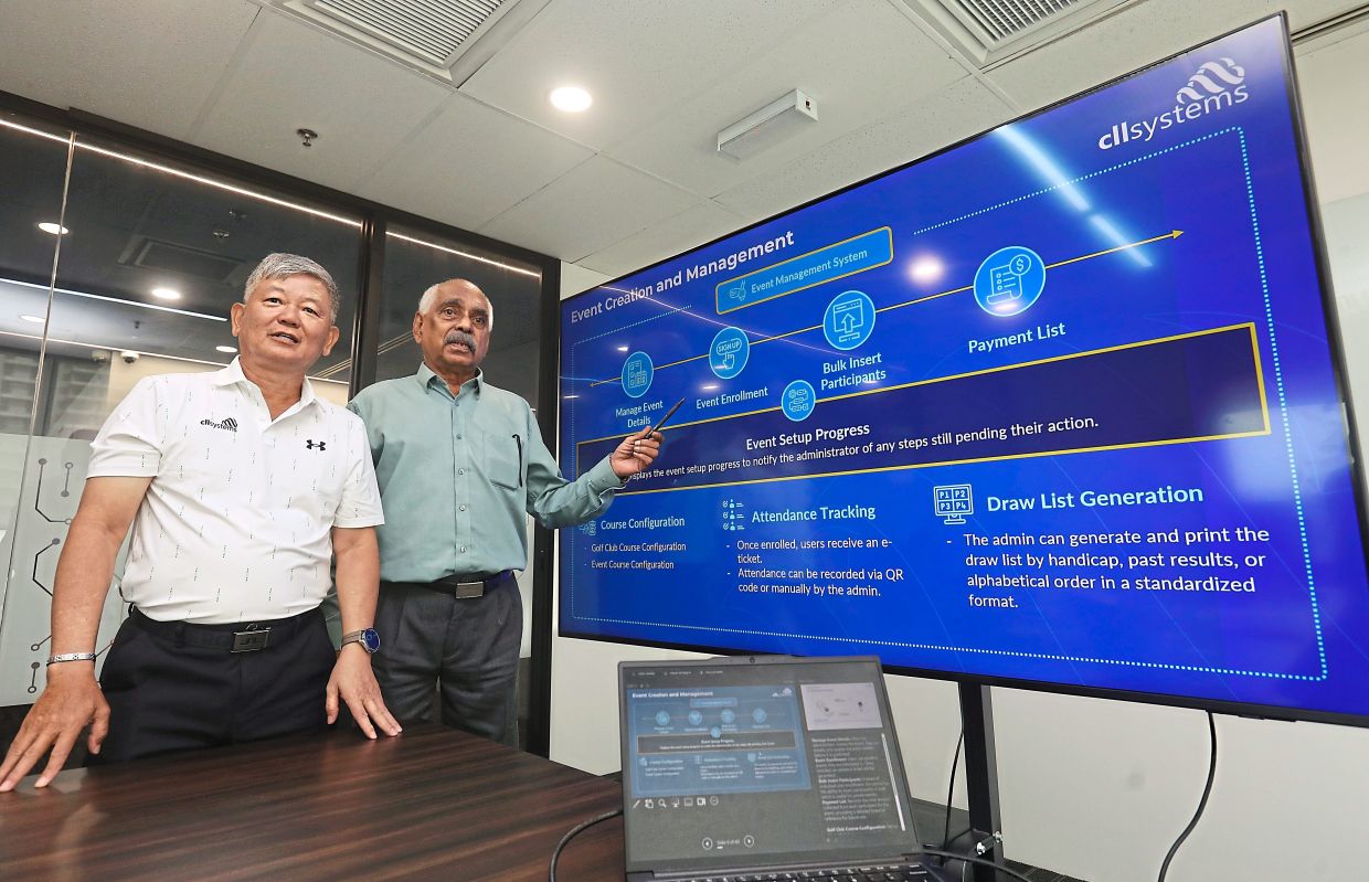 Sivanandan (right), seen here with Chong, believes technology can also play a positive role by motivating players to improve and take their game more seriously. — AZLINA ABDULLAH/The Star