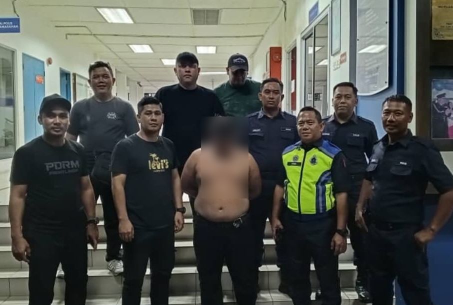 The suspect after being arrested by police.