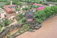 Four killed as floods soak northern region