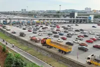 Private car users would have faced steep toll hike without postponement, Dewan Rakyat told