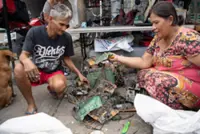 'Food on table' outweighs health risks for Philippine e-waste dismantlers