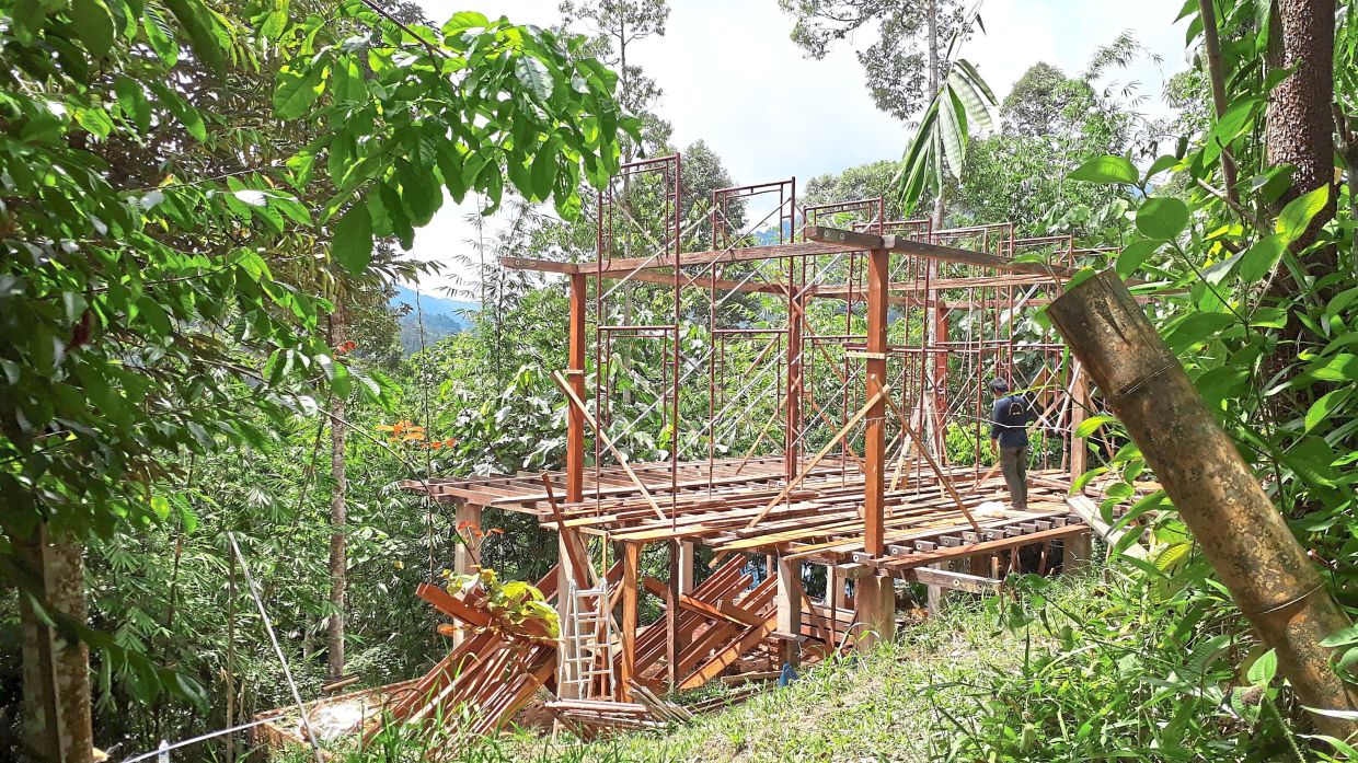 Despite having no experience in housebuiling, Zainal persevered.