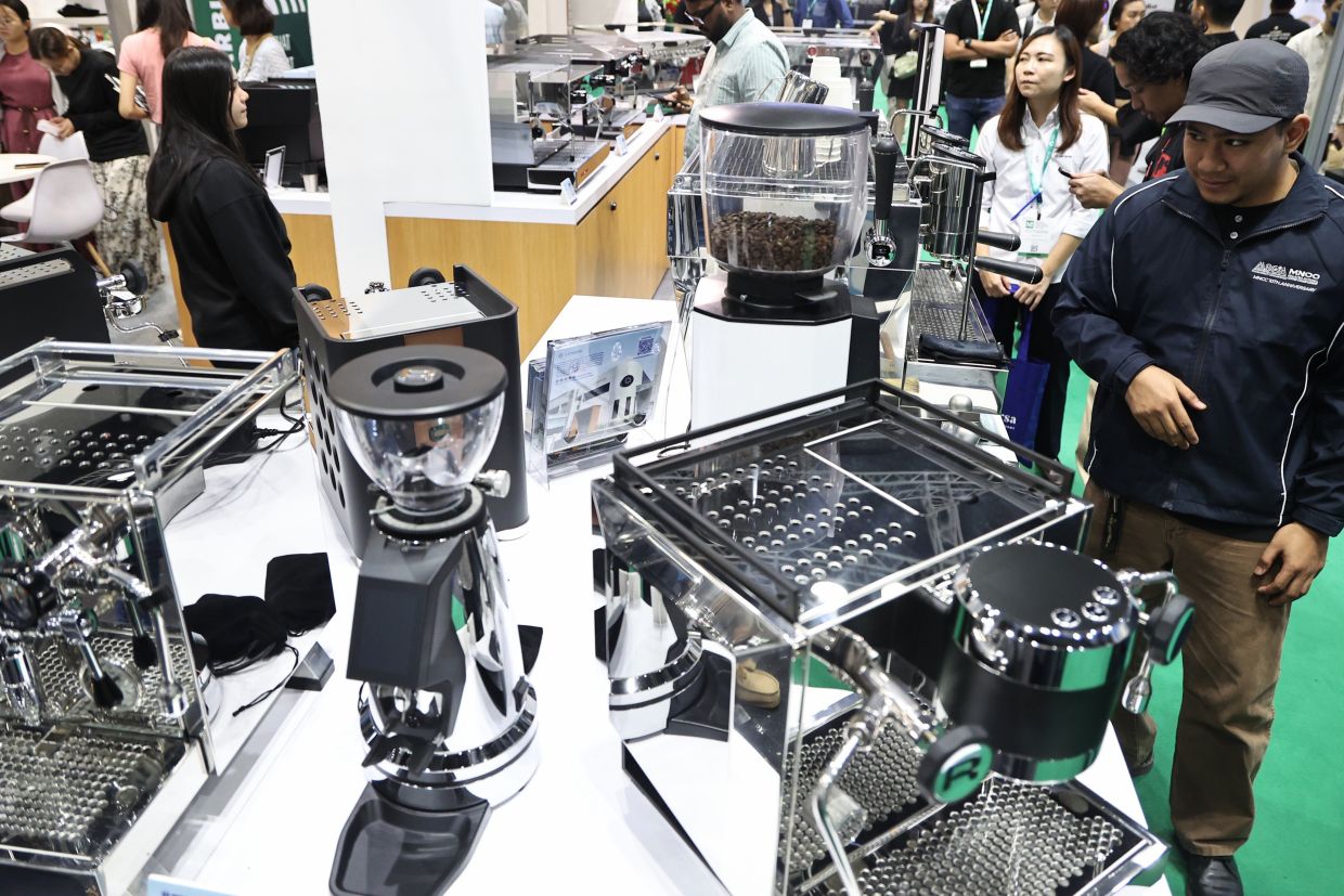Visitors visiting the booth during the Malaysian International Food and Beverage Trade Fair (MIFB) at Kuala Lumpur Convention Centre on July 30.-AZMAN GHANI/The Star