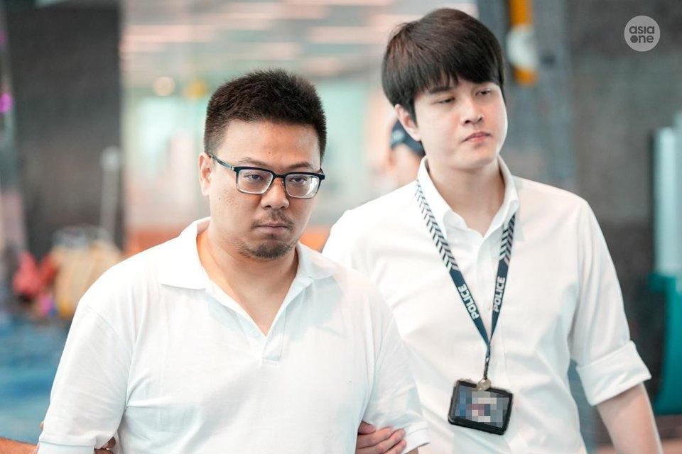Chinese national Wang Wei (left) has been charged after he was arrested at Changi Airport. - Photo: Asiaone