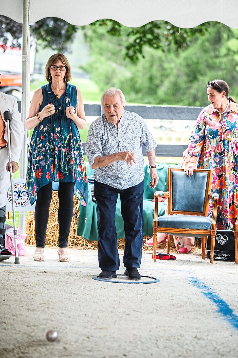 Pépin plays pétanque during one of his 90 birthday parties.