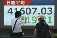 Markets mixed as China-US talks end, eyes on tech earnings