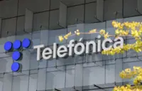 Telefonica books $59 million net loss in second quarter on currency swings