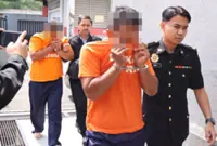 Two cops remanded over case involving RM635,000 bribe