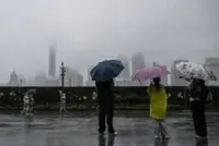Shanghai evacuates 283,000 people as typhoon hits