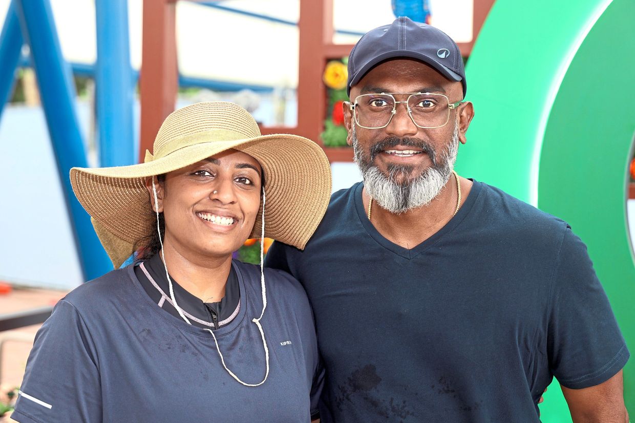Dr Tharani and husband S. Veluppillay enjoying their first visit to Legoland Malaysia.