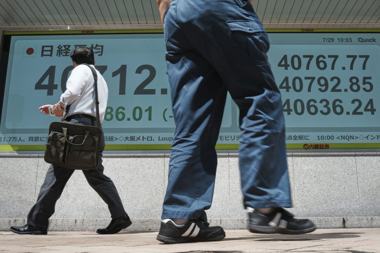 Stock futures rise on tech earnings, dollar steady