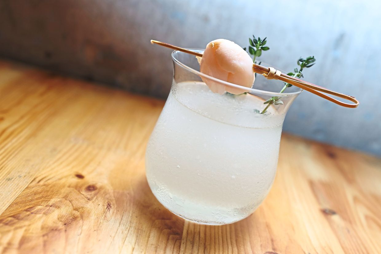 The Lychee Saketini Slushie is a sweet and sour drink.
