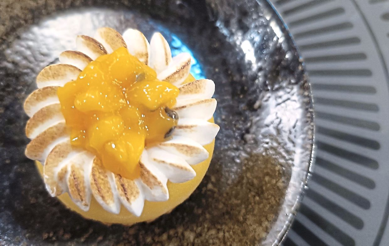 Mango Passion Fruit Vacherine with Coconut Sable.