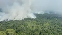 Water bombing slows 105ha bushfire in Mukah