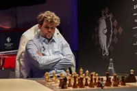 Chess-Carlsen claims first Esports World Cup title