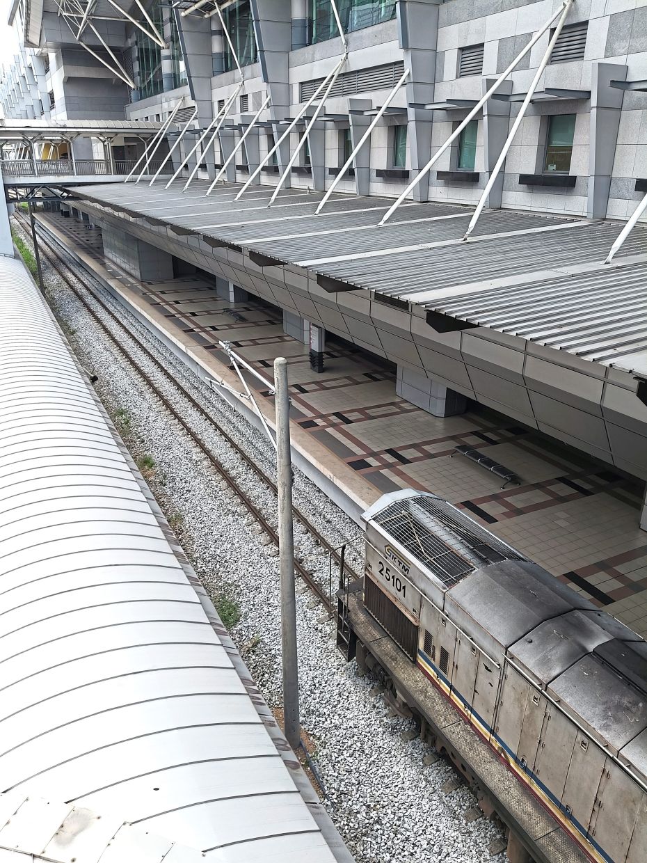 Incomplete: A lot of work still needs to be done to KTMB’s rail electrification and signalling infrastructure in the second half of the Gemas-JB double tracking project. At JB Sentral (pic), only a rudimentary pole structure is seen on July 28. — MENG YEW CHOONG/The Star