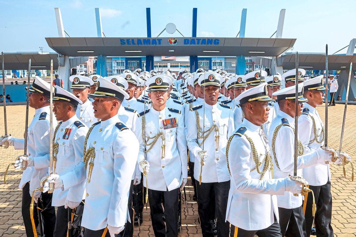 Ready for service: Trainees marching out after their graduation ceremony at the Amsas, where a total of 68 officers and 186 members had successfully undergone 10 months of basic training to qualify them to become officers and members of the MMEA at the Amsas in Gebeng, Pahang. — Bernama