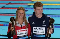 Singapore: Swimming world championships - Australia's beaming Harris foils Walsh treble bid at worlds