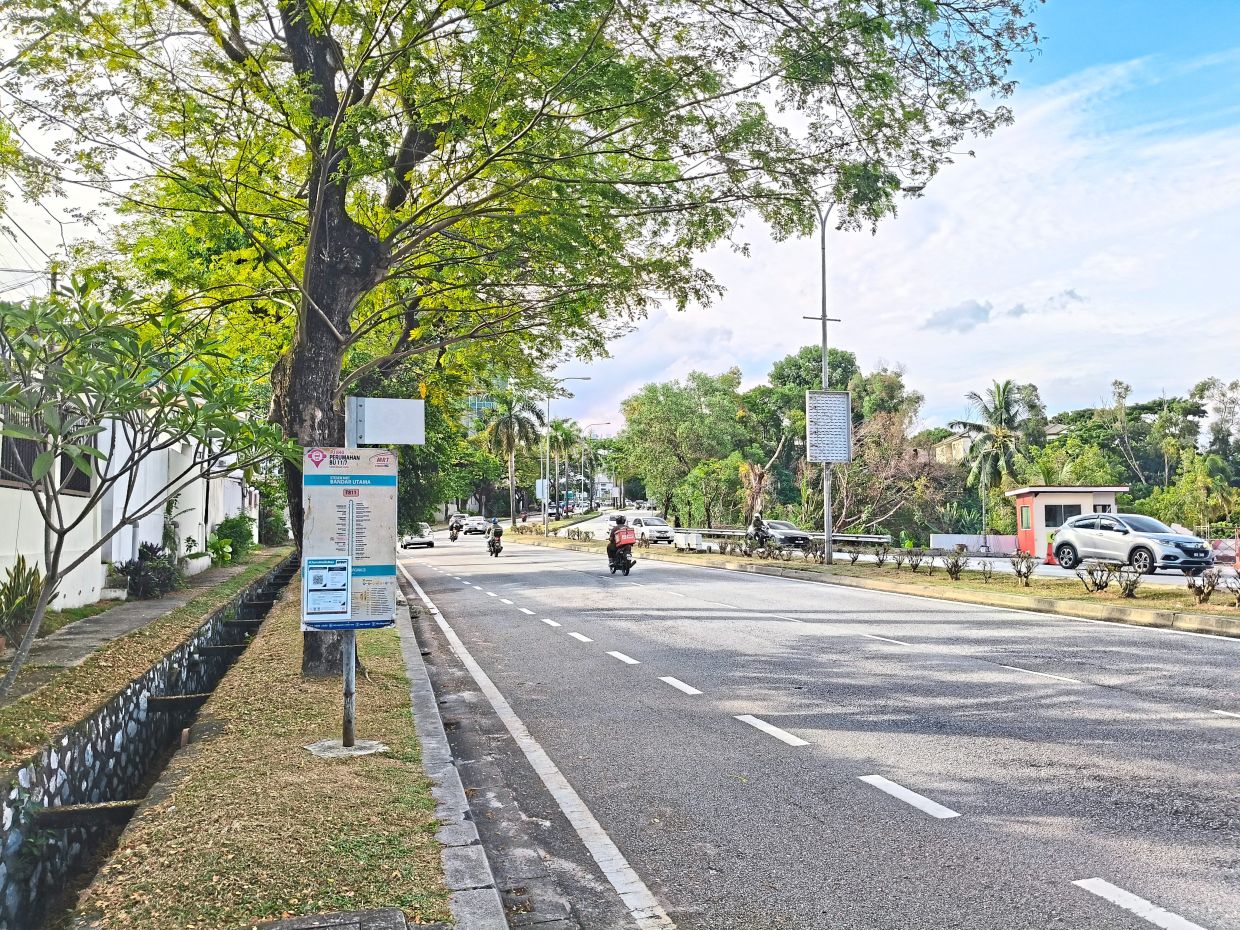 Some bus stops in Bandar Utama, Selangor, are unsheltered with just a pole displaying its routes.