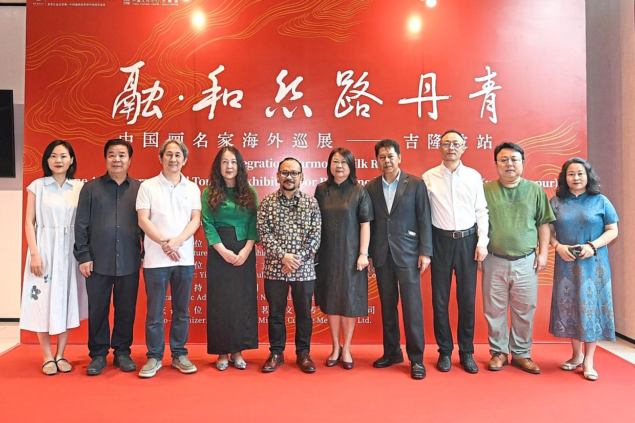 (From left) Ding, Wei, Zeng, Siri, Baktiar, Han, Prof Suzlee, Bao, Sun and exhibition curator Liu Shufei at the launch of ‘Integration Harmony: Silk Road Fine Arts International Touring Exhibition for Renowned Chinese Painters’ exhibition. — Photos: ONG SOON HIN/The Star